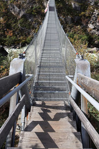 Vetical photo of a long suspension bridge