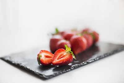 Close-up of strawberry fruit on table