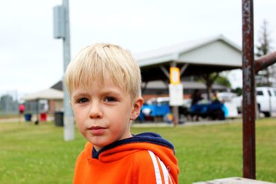 Portrait of cute boy in park