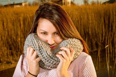 Portrait of a smiling young woman in winter