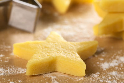 Close-up of yellow bread on table