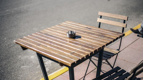 High angle view of empty bench on table