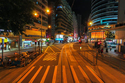 View of illuminated street at night