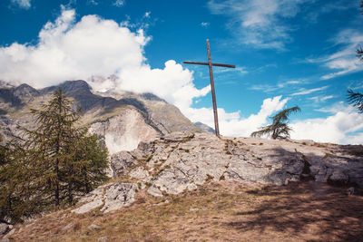 Low angle view of rocks against sky