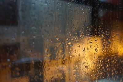 Close-up of water drops on glass