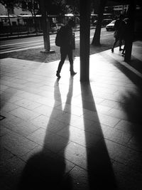 Shadow of woman on wall