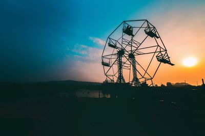 Silhouette of landscape against sky during sunset