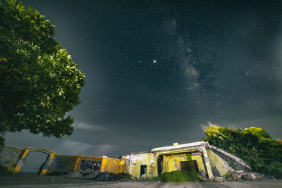 Low angle view of building against sky at night