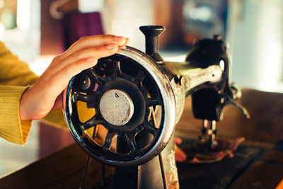 Close-up of hand holding camera