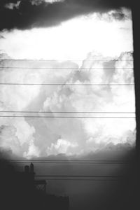 Low angle view of cables against sky