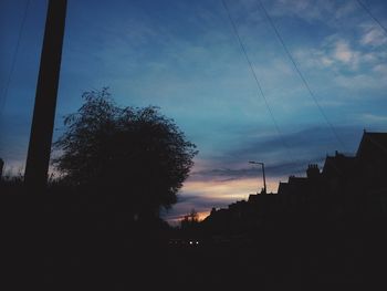 Silhouette of buildings at sunset