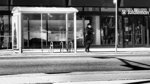 People walking on street in city