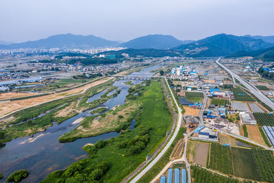 High angle view of road amidst buildings in city