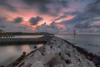 Panoramic view of sea against sky at sunset