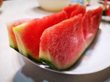 High angle view of fruit in plate on table