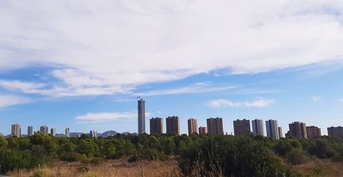 Panoramic view of modern buildings against sky