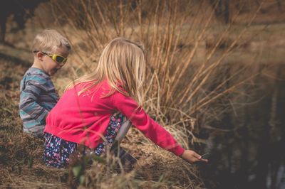 Children on lakeshore