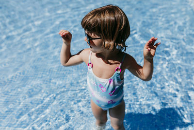 Full length of woman in swimming pool