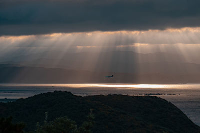 Scenic view of sea against sky during sunset