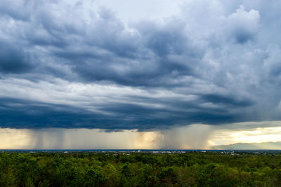 Scenic view of storm clouds over land