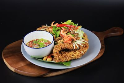 Close-up of food served on table