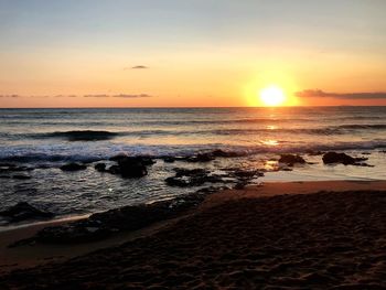 Scenic view of sea against sky during sunset