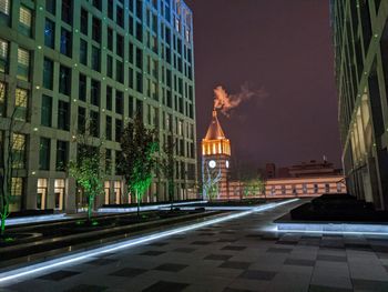 Illuminated buildings in city at night