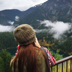 Woman standing on mountain landscape