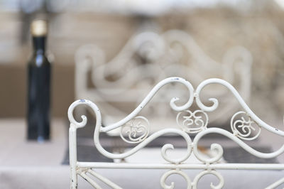 Close-up of heart shape on railing