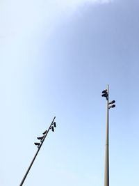 Low angle view of street light against clear sky