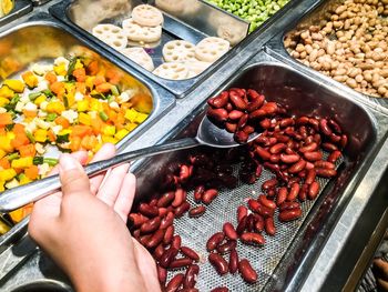 High angle view of person preparing food for sale