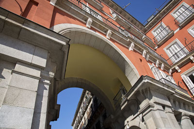 Low angle view of arch bridge against sky