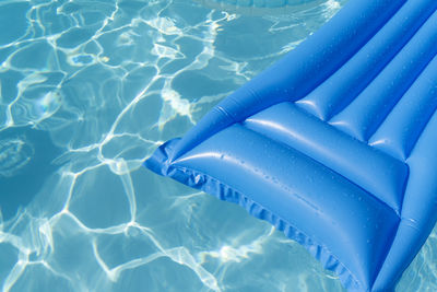 High angle view of swimming in pool