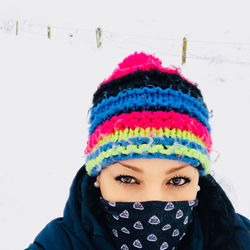 Portrait of woman with snow covered face