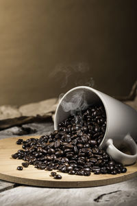 Close-up of coffee beans on table