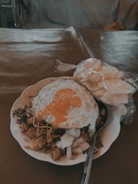 High angle view of fried rice in plate on table