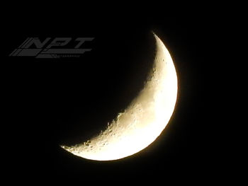 Scenic view of moon against sky at night
