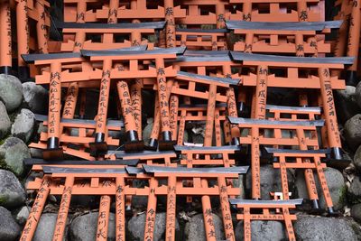 Stack of firewood against temple