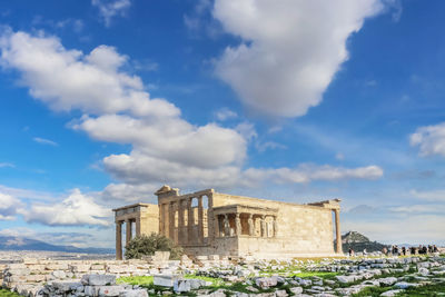 Historic building against cloudy sky