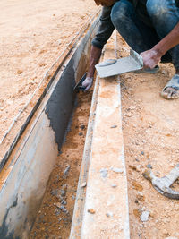 Low section of man on footpath