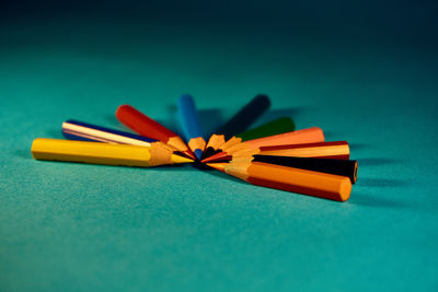 Close-up of colored pencils on table