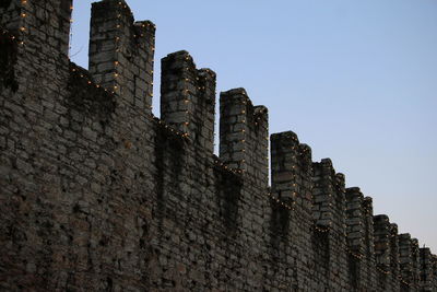 Low angle view of castle against clear sky