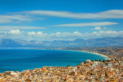 Scenic view of sea against blue sky