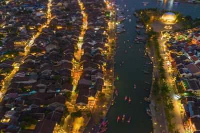 High angle view of illuminated buildings at night