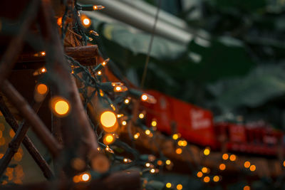 Lights on a model train bridge