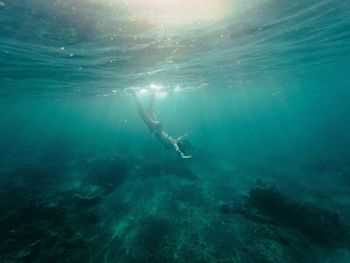 Man swimming in sea