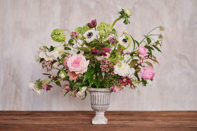 Close-up of rose flower vase on table