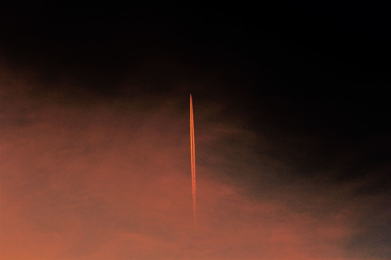 LOW ANGLE VIEW OF VAPOR TRAIL IN SKY