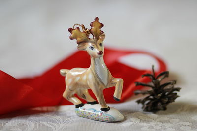 Close-up of figurine on table
