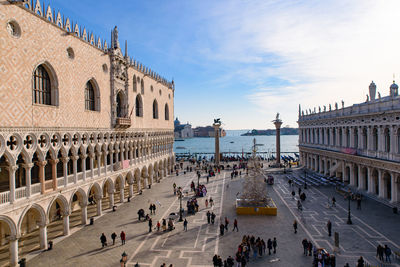 Group of people in front of historical building